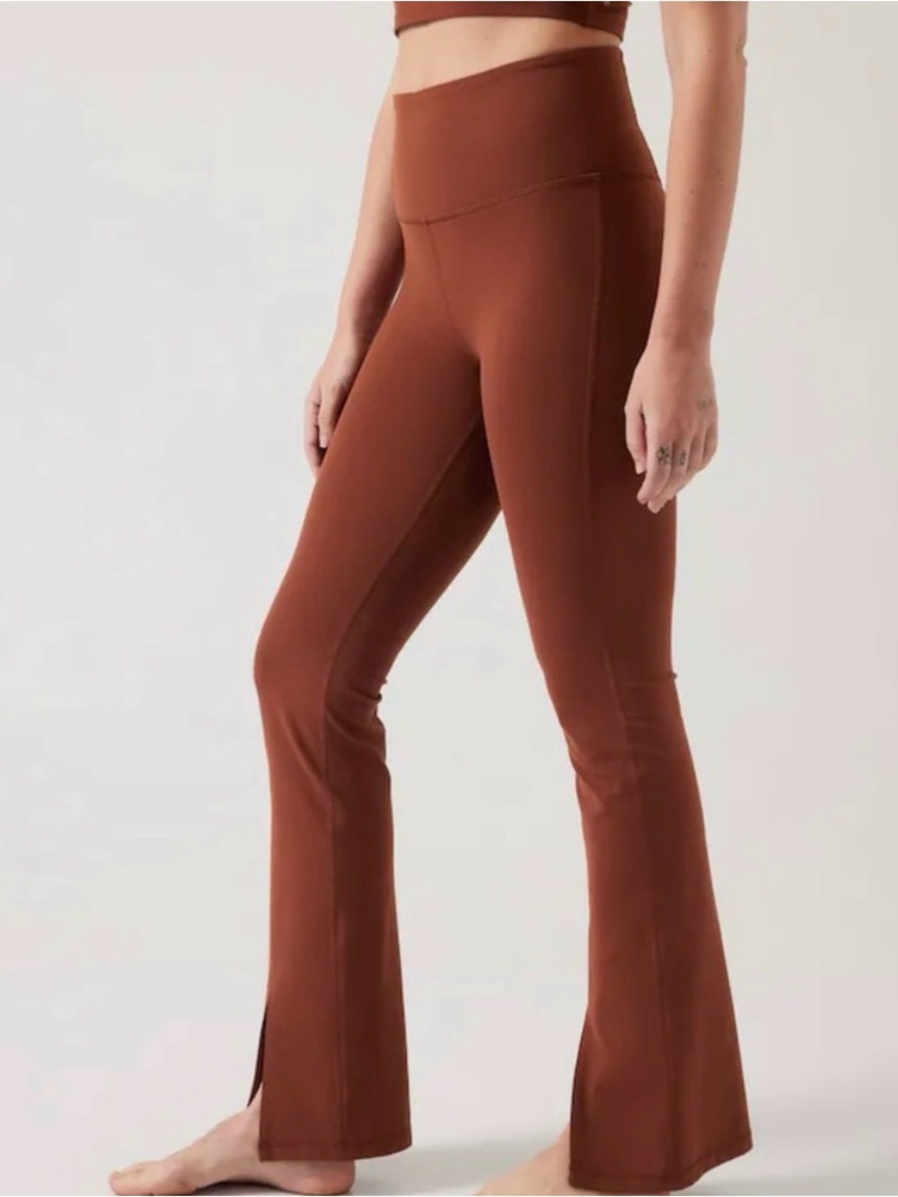 Athleta High-Waist Flared Yoga Pants in Rust